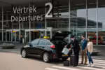 Schiphol taxi korting Den Taxi
